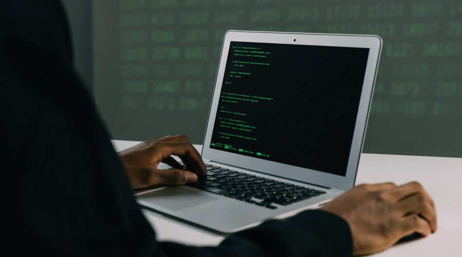 Free Person Using Macbook Air Stock Photo