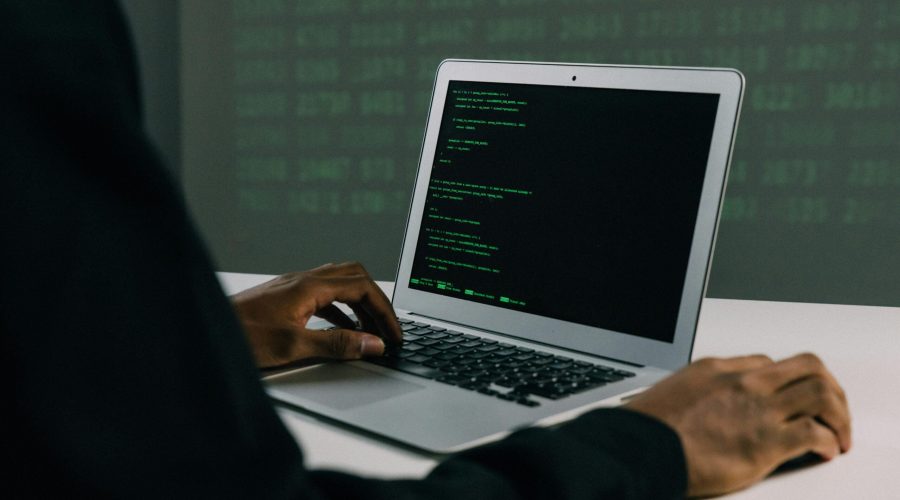 Free Person Using Macbook Air Stock Photo