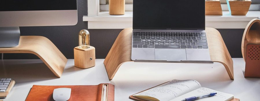 Free A stylish and contemporary home office setup with laptop and desk accessories. Stock Photo
