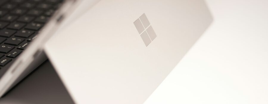 white-laptop-computer-on-white-table