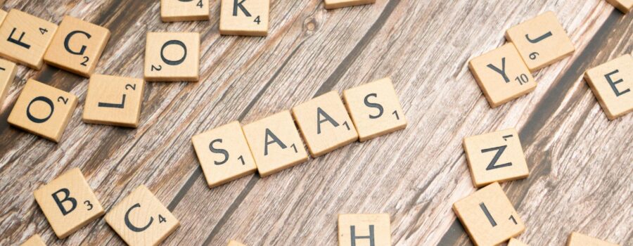 scrabble-letters-spelling-saas-on-a-wooden-tabl