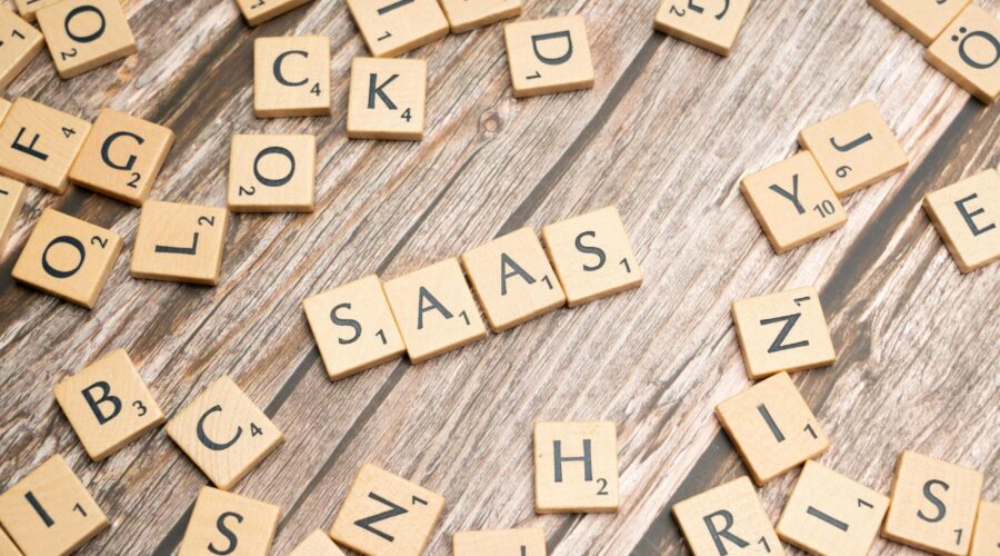 scrabble-letters-spelling-saas-on-a-wooden-tabl