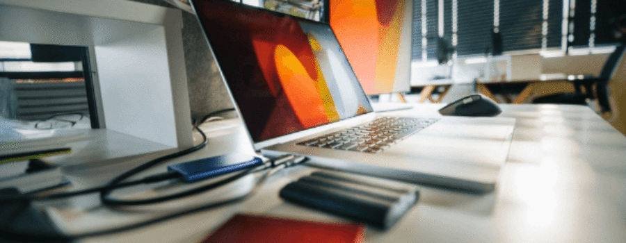 laptop with storage device plugged in